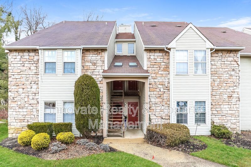 Beautifully maintained first-floor condo located in the desirable Tavistock community property image