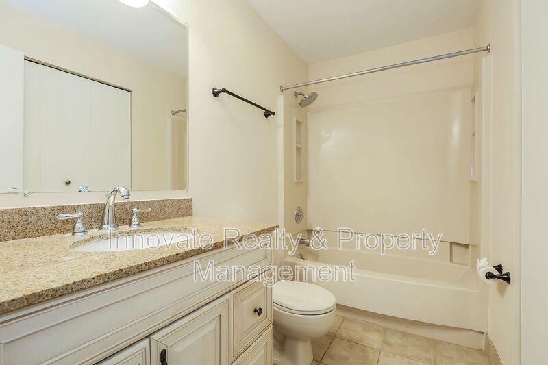 Beautifully maintained first-floor condo located in the desirable Tavistock community property image