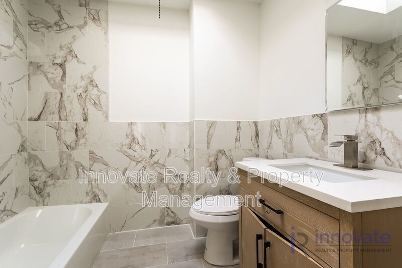 Now available – recently renovated 3-bedroom home with a private fenced yard in West Philadelphia! property image